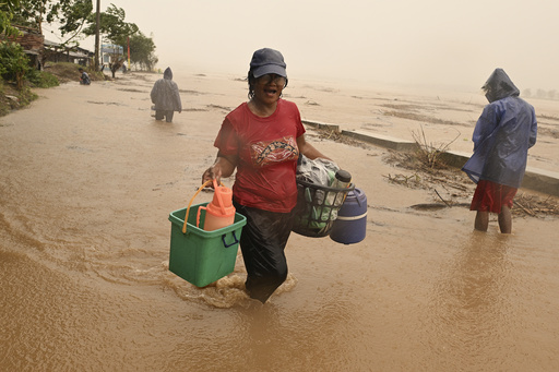 Typhoon hits already ravaged Philippines, displacing thousands as another storm looms.