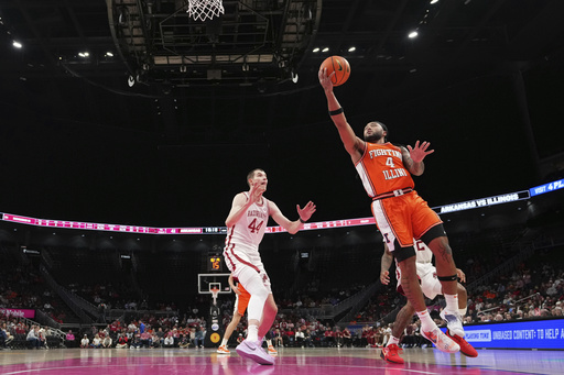 Kasparas Jakucionis nets a career-high 23 points, leading Illinois to a 90-77 victory over No. 19 Arkansas.