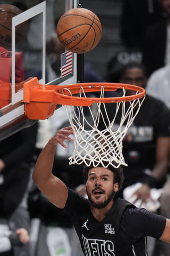 Cam Johnson and Dennis Schroder lead the Nets to a narrow 116-115 victory against the Hornets