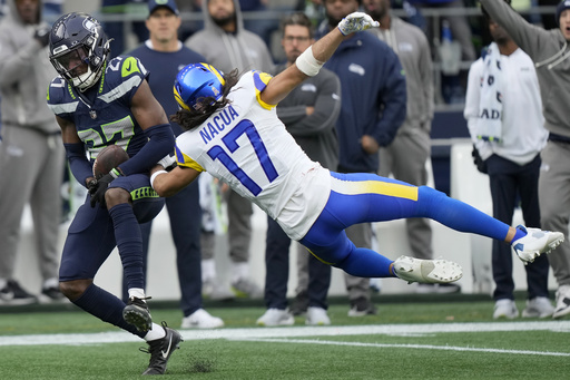 Rams’ Puka Nacua thrown out for punching Seahawks linebacker Tyrel Dodson