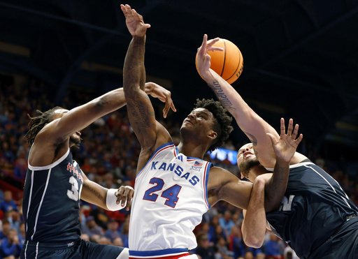 Mayo nets 19 points as top-ranked Kansas triumphs over Howard 87-57 in debut match