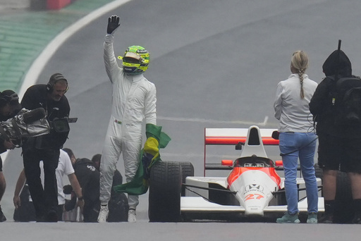 Hamilton shares emotional moment driving Senna’s car ahead of Brazilian Grand Prix, wishes he could race it.