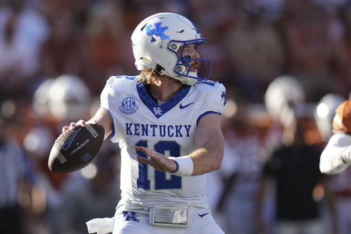 Helm’s pair of touchdown receptions lead No. 3 Texas to a 31-14 victory against Kentucky, maintaining Longhorns’ lead in the SEC