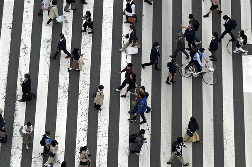 Japan approves a $250 billion economic plan aimed at increasing wages and stimulating growth.