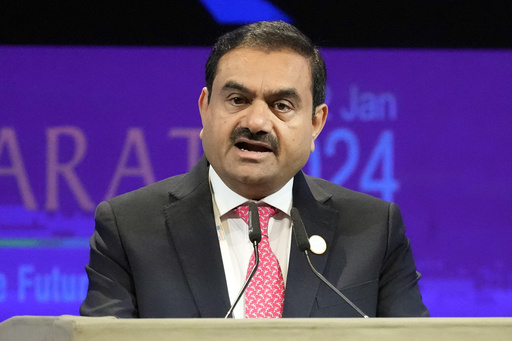 Adani Group’s stock falls 20% following US indictments for bribery and fraud.