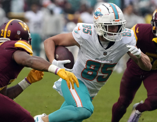 Dolphins designate right tackle Austin Jackson to injured reserve and promote receiver River Cracraft