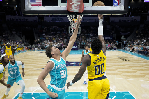 Ball records 31 points and Miller adds 29 as the Hornets defeat the Pacers, 103-83.