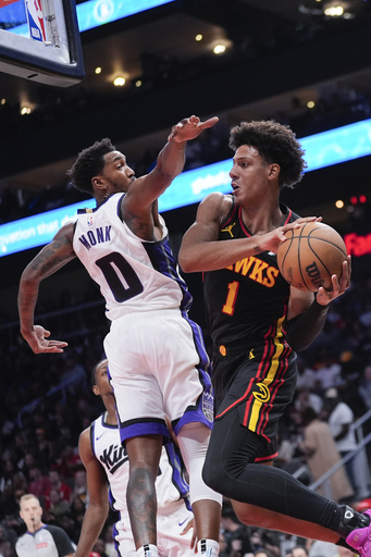 De’Aaron Fox guides Kings to 123-115 victory against depleted Hawks