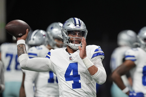 Cowboys quarterback Dak Prescott leaves Atlanta game due to hamstring injury.