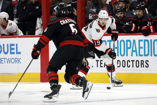 Spencer Martin achieves his first career shutout while Hurricanes score 4 against Senators.