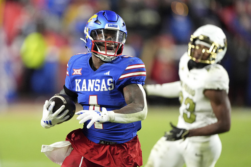 AP Player of the Week: Devin Neal amasses 207 rushing yards and scores 4 touchdowns in Kansas’ victory against Colorado