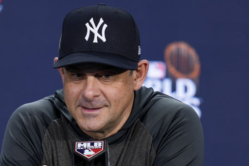 Cashman appears poised to retain Boone as manager while addressing Kelly’s criticisms of the Yankees.