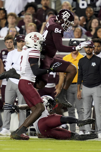 Reed delivers three touchdowns as No. 15 Texas A&M triumphs 38-3 against New Mexico State