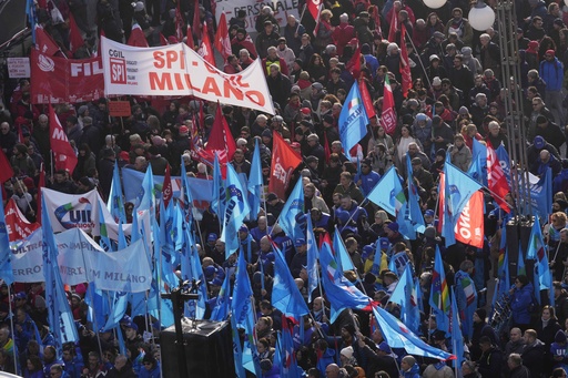 Thousands of workers rally throughout Italy in a nationwide strike for improved wages and services.