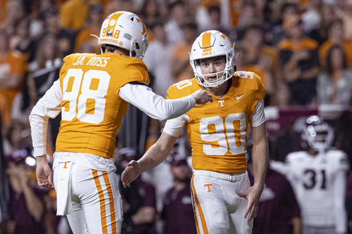 Sampson guides No. 7 Tennessee to a 33-14 victory against Mississippi State, though Iamaleava leaves the game due to injury.