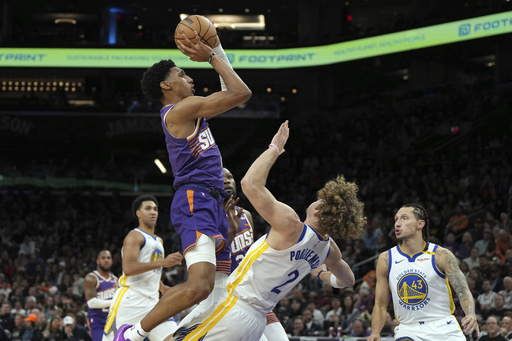 Booker nets 27 points, leading Suns to 113-105 victory while Warriors face fourth consecutive defeat