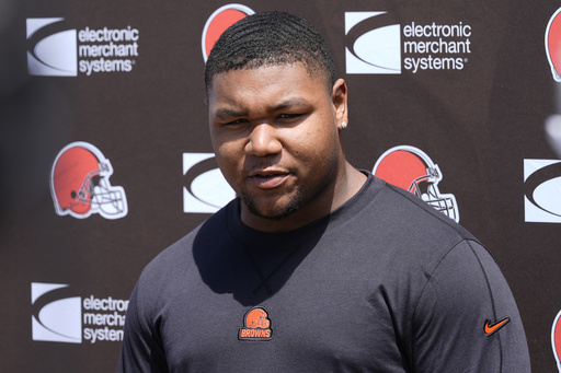 Browns rookie defensive tackle Mike Hall Jr. sustains knee injury; coach indicates he may be placed on injured reserve.