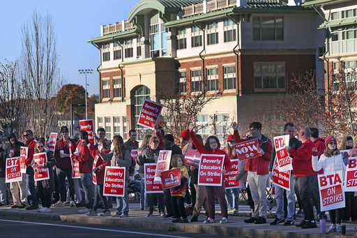 In two Massachusetts school districts, educators initiate a strike.