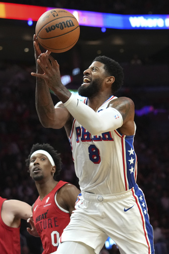 Heat overcome early setback to defeat struggling 76ers 106-89