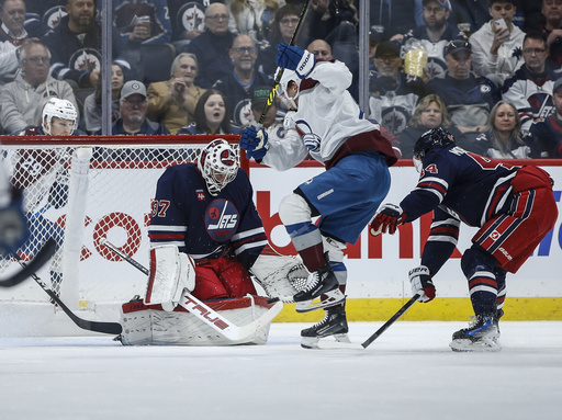 Vilardi nets a goal, and Hellebuyck makes 35 saves for his third shutout this season in Jets’ 1-0 win over Avalanche.