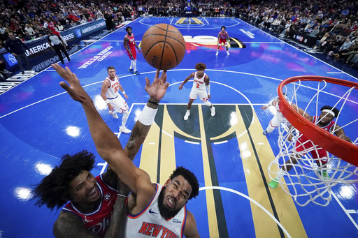 Anunoby guides Knicks to victory over faltering 76ers 109-99 in Embiid’s first game