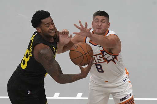 Booker nets 31 points to guide Suns past Jazz 120-112 in NBA Cup debut