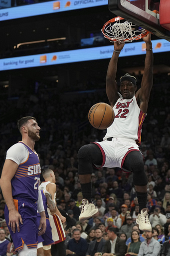 Durant nets 32 as Suns come back from 15-point deficit to defeat Heat 115-112, securing sixth straight win.