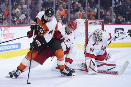 Hurricanes surge with three goals early in the third to beat Flyers 4-1