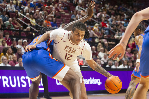 Clayton nets 25 points as No. 20 Florida, under Todd Golden, defeats Florida State 87-74 away from home