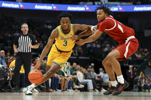 Jayden Nunn records 16 points, Norchad Omier achieves double-double in No. 8 Baylor’s 72-67 victory over No. 16 Arkansas.