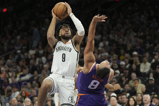 Tyrese Martin achieves career-best 30 points, guiding the Nets to a 127-117 victory over the Suns.