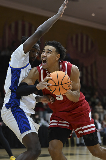 Tonje nets 33 points as No. 19 Wisconsin triumphs over Pittsburgh 81-75 to secure Greenbrier Tip-Off championship