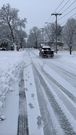 Winter storm covers areas of the US as holiday travel peaks, with additional snow and cold expected.