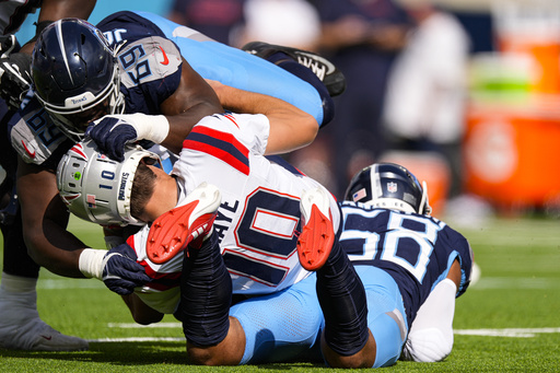 Drake Maye shines with crucial touchdown, sending Patriots to overtime before final interception seals game.