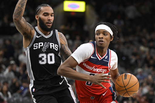 Wembanyama scores a personal best of 50 points and hits 8 three-pointers as Spurs defeat Wizards, 139-130.