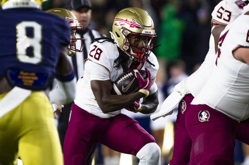 Riley Leonard scores 2 rushing touchdowns, throws a touchdown pass as No. 10 Notre Dame crushes Florida State 52-3