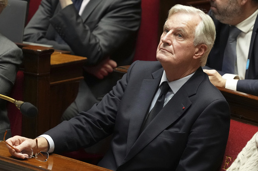 French government faces potential collapse from no-confidence vote, a first since 1962.