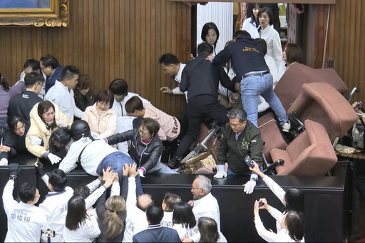 Taiwan’s legislative assembly witnesses turmoil as one party storms in to seize control of the speaker’s position.