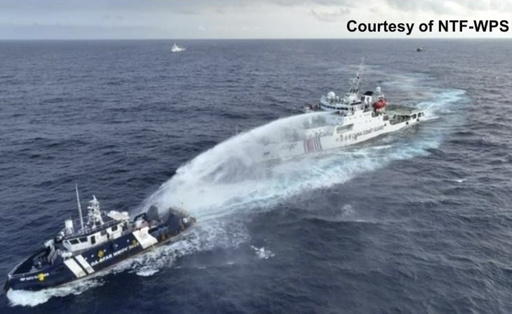 Philippines reports that Chinese coast guard uses water cannons and collides with patrol boat.