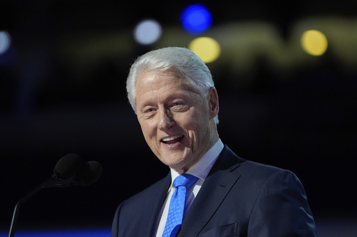 Spokesperson reports Bill Clinton hospitalized for fever, but remains positive.