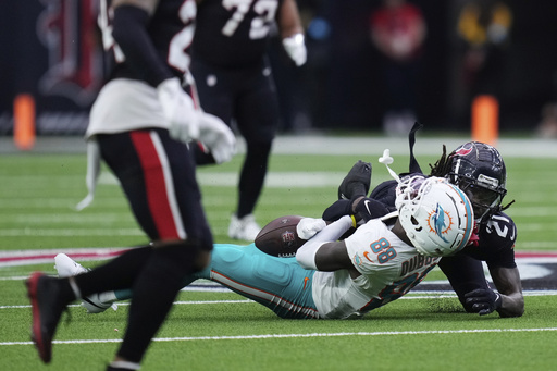 Dolphins’ Grant DuBose shows signs of movement in limbs following frightening head injury against Texans