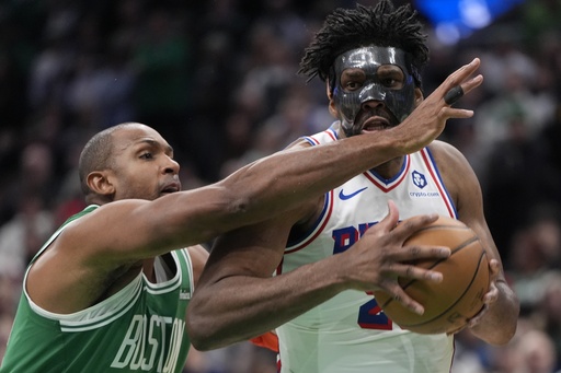 76ers’ Joel Embiid takes a tumble during warmup but is set to play against the Celtics