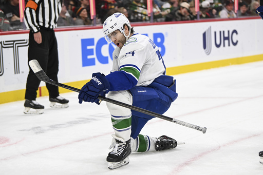 Kaprizov nets overtime goal as NHL-leading Wild come back to defeat Canucks 3-2