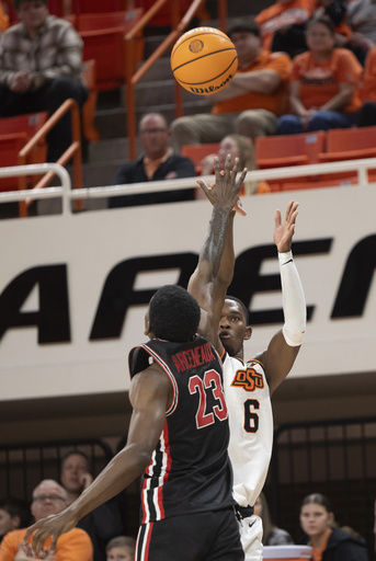 No. 14 Houston secures victory over struggling Oklahoma State 60-47 in their Big 12 debut