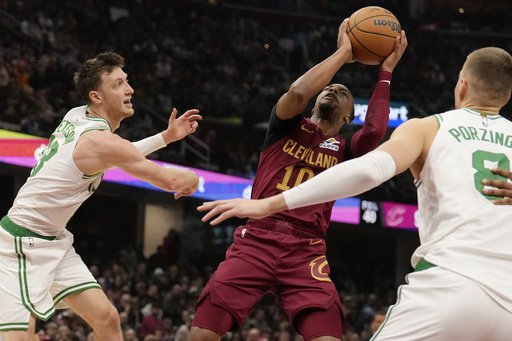 Mitchell tallies 35 points as Cavs snap Celtics’ winning streak with 115-111 victory in clash of Eastern Conference powerhouses.