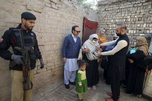 Bomb blast in northwest Pakistan claims the lives of 3 police officers protecting polio workers.