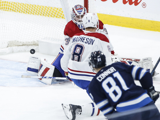 Connor Hellebuyck stops 26 shots as Jets defeat Canadiens 4-2