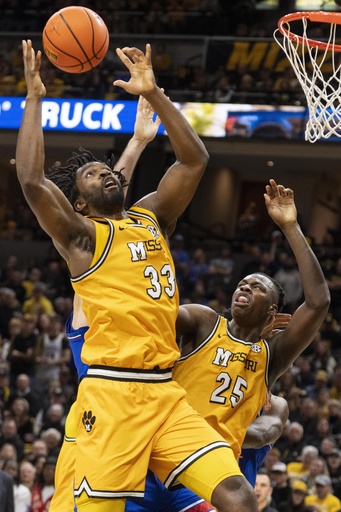 Tamar Bates leads Missouri to a 76-67 victory over top-ranked Kansas with 29 points.