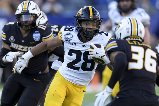 Missouri, ranked 23rd, comes back from a 10-point deficit to defeat Iowa 27-24 in the Music City Bowl.