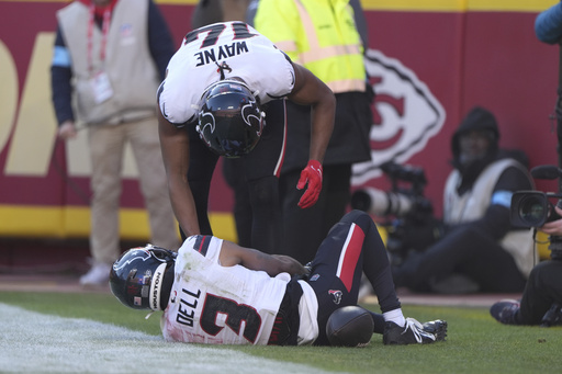 Texans receiver Tank Dell admitted to hospital following serious knee injury during touchdown reception against Chiefs